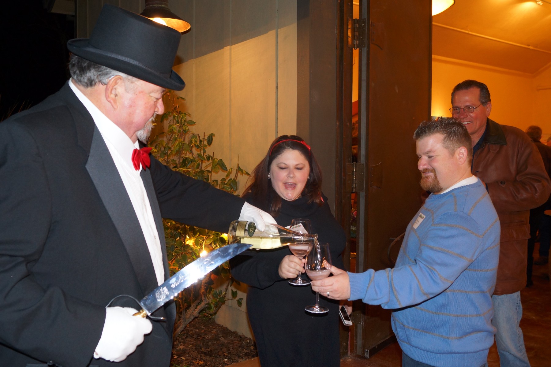 Owner Mike Farrow Pouring Sparkling Blanc de Blanc at Amista Vineyards Sparkling Holiday Party, Healdsburg
