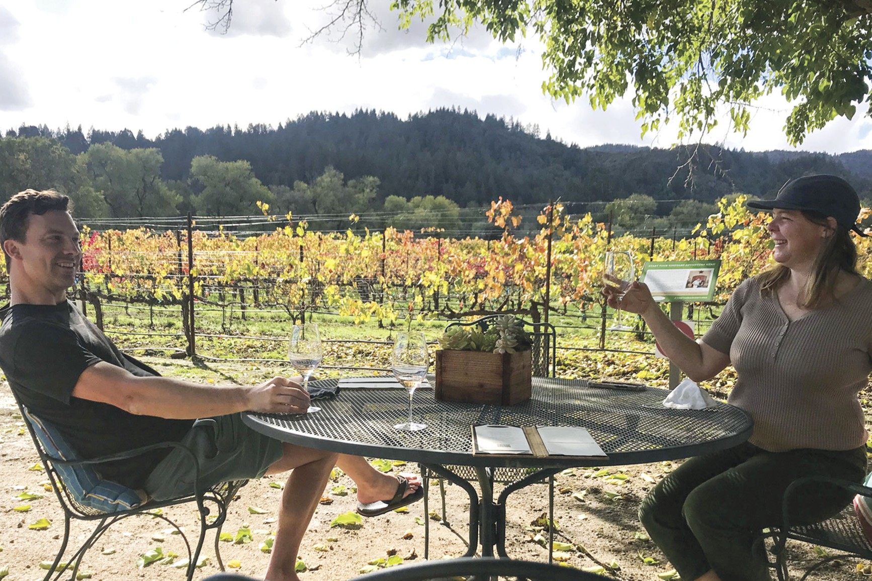 Amista Tasting Sparkling Wine in the Vineyards