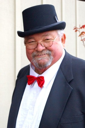 Amista Vineyards Proprietor and Winemaker Emeritus, Mike in his tux and top hat.