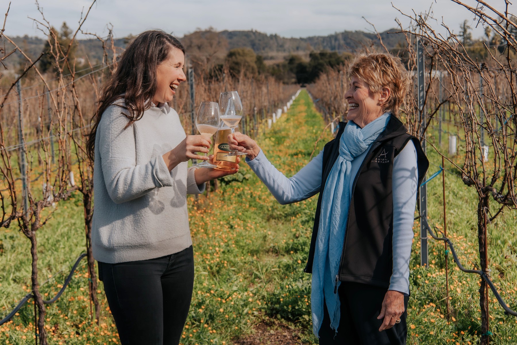 Amista Winemaker and Owner Toasting in the Vineyards for Women's History Month